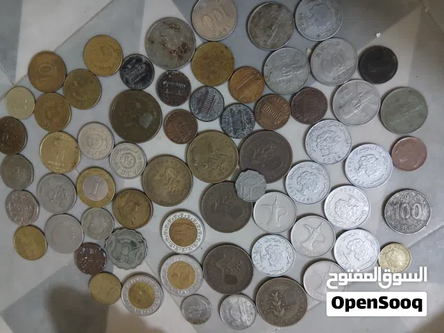 عملات معدنية قديمة وجديدة