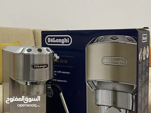 ماكينة ديلونجي ديدكا + مطحنة هيبرو g3 + جميع ادوات عمل الاسبريسو