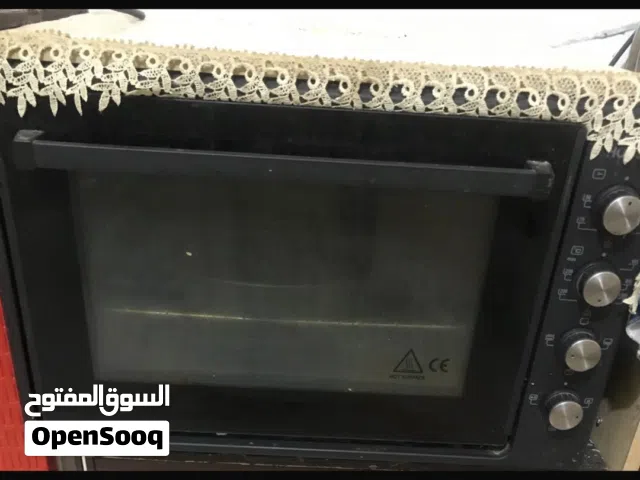 اوفن كهرباىي اسود مع مايكرويف احمر نضيفات جدا