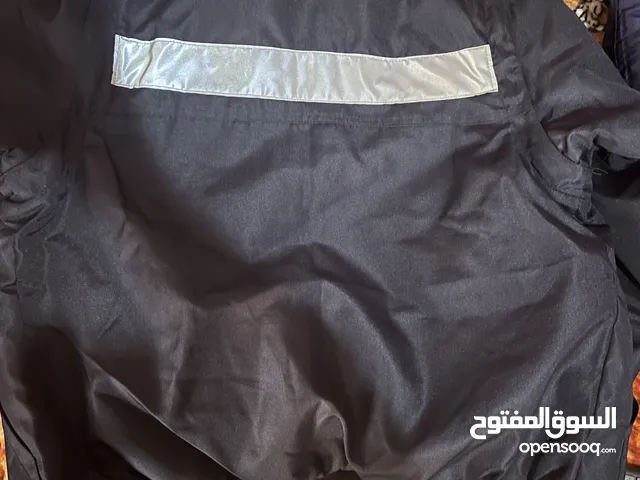 معطف مقاوم للرياح و الشتاء و يتحول الى معطف دون يدين نصف كم
