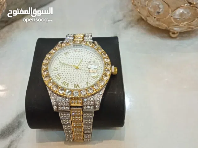 ساعه جديد لون ذهبي