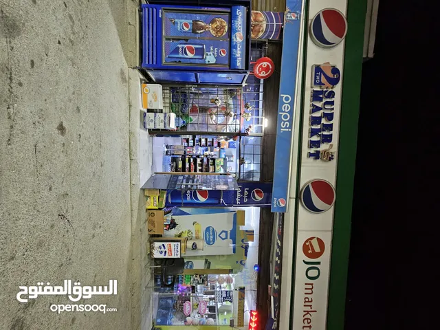 سوبر ماركت مع قهوة داخل كازية للبيع بكامل المعدات والبضاعة