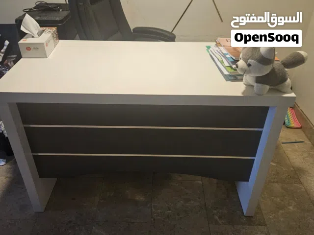 office desk and chair and side table