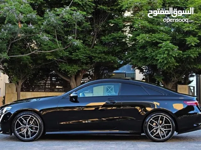 بحال الوكالة A+ عداد 23 الف كم E200 Coupe Mild Hybrid Night Package AMG KIT داخلي وخارجي