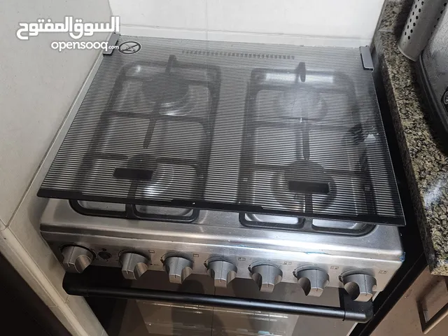 Midea 60x60cm freestanding cooker. 4 burners