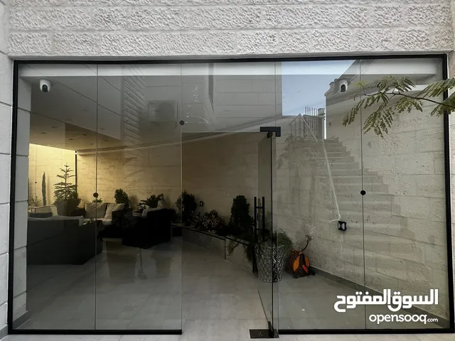 صيانة و وتبديل ماكينات ابواب الزجاج السيكوريت وتركيب جميع اعمال الوجهات السيكوريت والزجاج