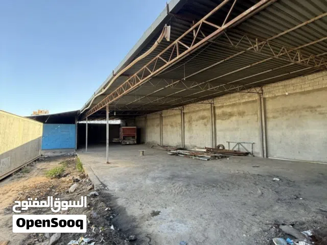 ارض تجارية في تاجوراء  طريق 55 عالطريق