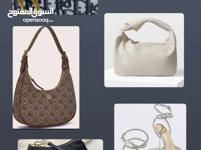 اربع شنط مع كعب استعمال خفيف ب 5 فقط