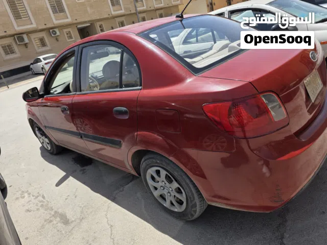2011 كيا ريو Standard
