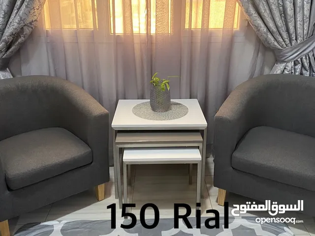 Gray sofa and 3 tables