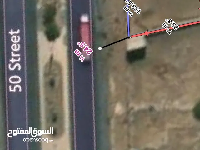 موقع تجاري شارع صنعاء مساحه الارض عشره الف متر