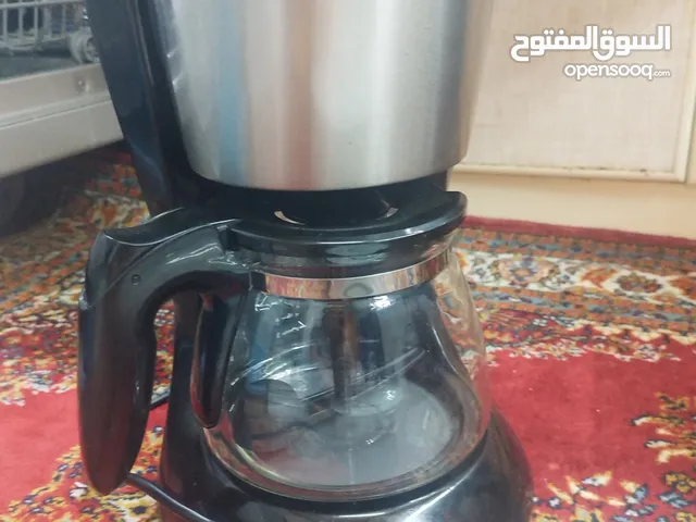 ماكينه قهوه سوداء