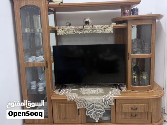 Large Solid Wood Entertainment Center – Fits 55" TV(2.16m Wide)/like new/ Price: 1000 aed Negotiable