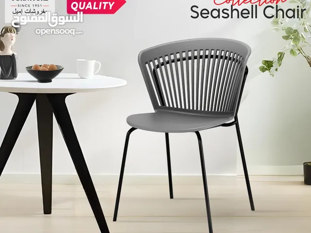كرسي عظم رمادي أرجل معدن متين  مناسب للكافيهات والمطاعم والمنازل، خدمة التوصيل متوفرة