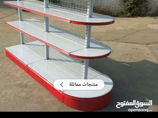 رفوف معدنيه وسطي وحائط
