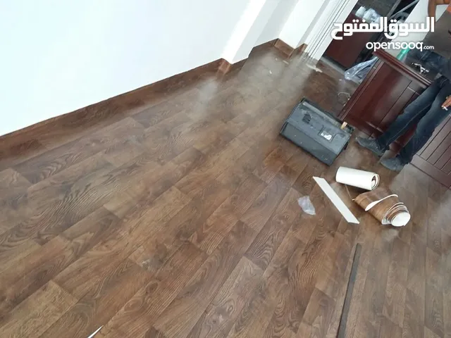 تركيب ارضيات فينيل باركيه جلد pvc درجات البني والخشابي
