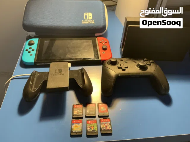 Nintendo Switch with official pro controller and 6 games listed in the description