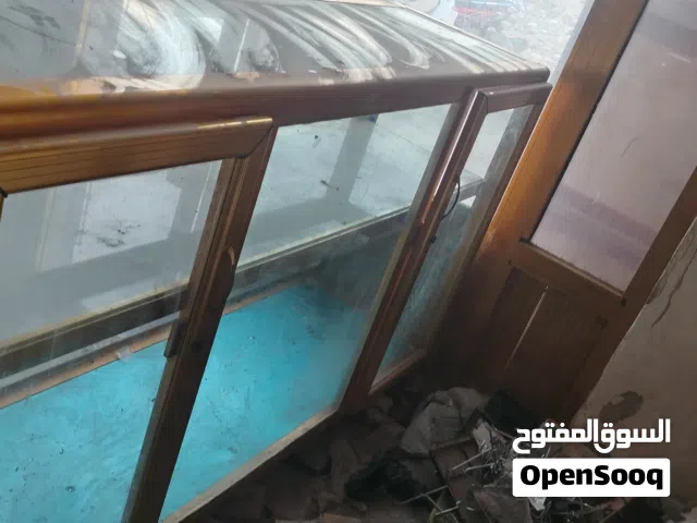 معرض المنيوم لعرض مواد بالمحل طابقين وبيبان اثنين الطول 2م والعرض 50 سم