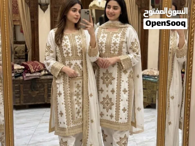 بيع وتفصيل الملابس التقليدية المطورة