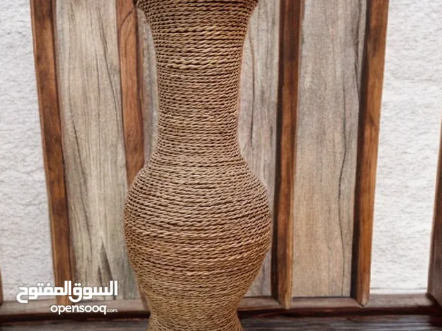 مزهرية تحفة جميلة وانيقة من الفخار والخيزران