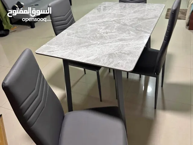 brand New dining table with 4 chair available