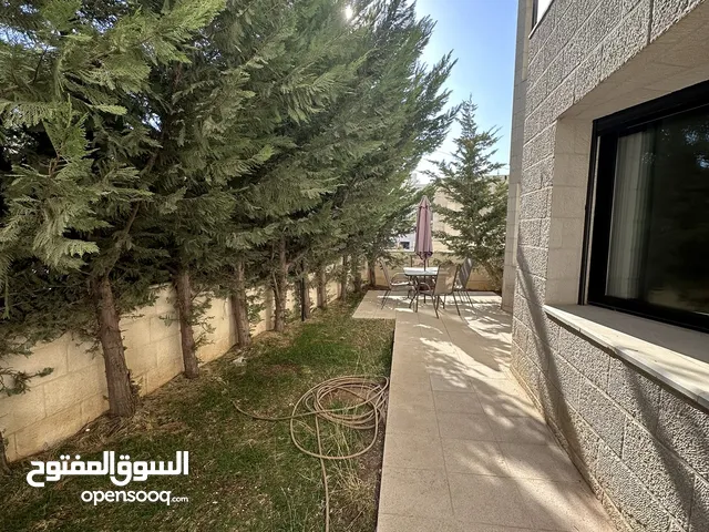 شقه مفروشة للايجار في دير غبار ارضية مع حديقه إماميه وترس خلفي .. مميزه جداً