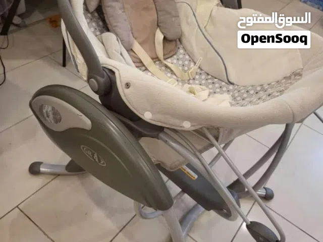 ارجوحة اطفال كهربائي ومشايه