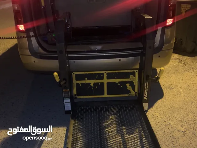 جهاز رافعة للكرسي المتحرك للسيارة