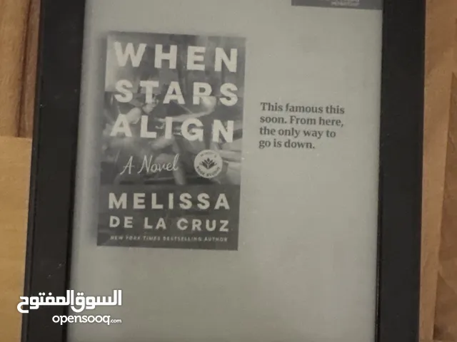Kindle 7th gen with a case and cable