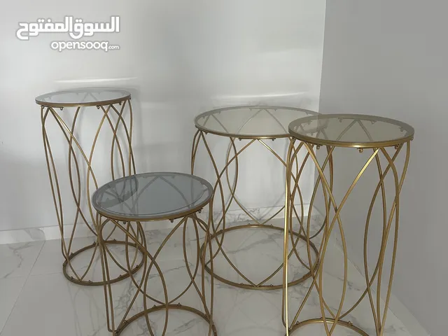 4 golden steel decorative tables