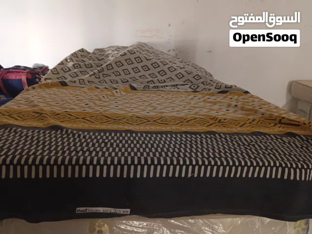 three single beds with mattress