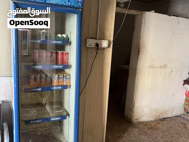 ثلاجة مع عارضات اثنين مستمعلات وشرط العمل والفحص