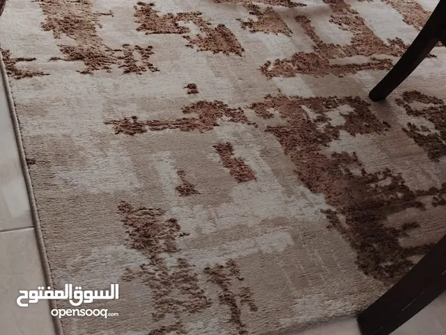 سجادة لون بيج