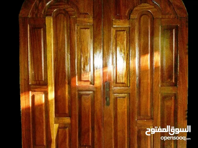 ابواب مصنوعه من خشب التيك   Doors made of teak wood