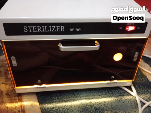 جهاز تعقيم ادوات الحلاقة