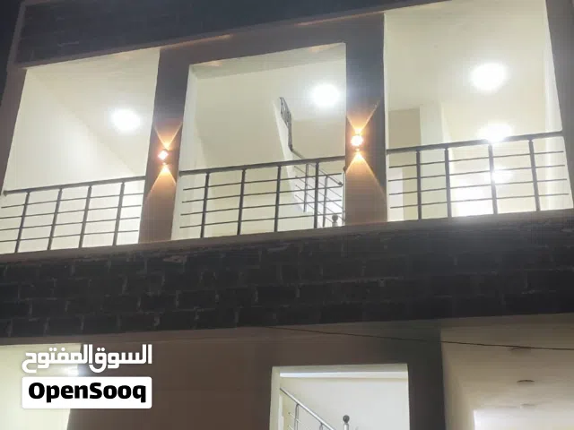 بناية للبيع مقابل مستشفى الكندي وجه بوجه (مستعجل ) السعر لاني مستعجل الله يشهد