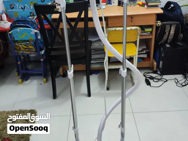 Title: Philips Upright Garment Steamer Description: A Philips stand-alone garment