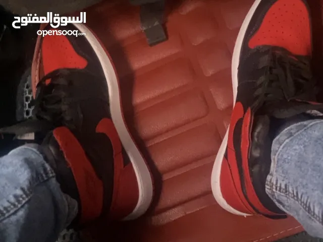 Air Jordan black and red colour way