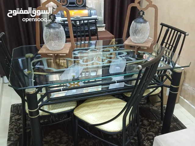 طاوله سفره مع قاعد حديد مع عدد 6كراسي
