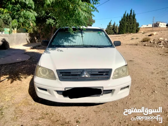 ميتسوبيشي لانسر موديل 2003 قير توماتيك مكيف حامي بارد سياره اقتصادية جداً مرخصة لغاية شهر 9