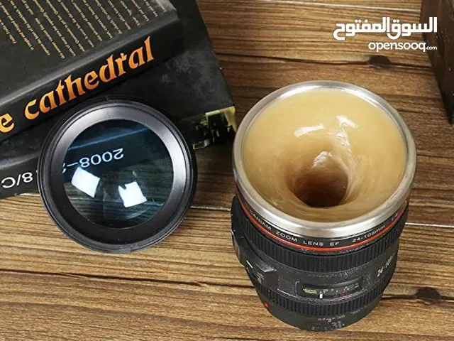 كوب قهوة على شكل  عدسة الكاميرا