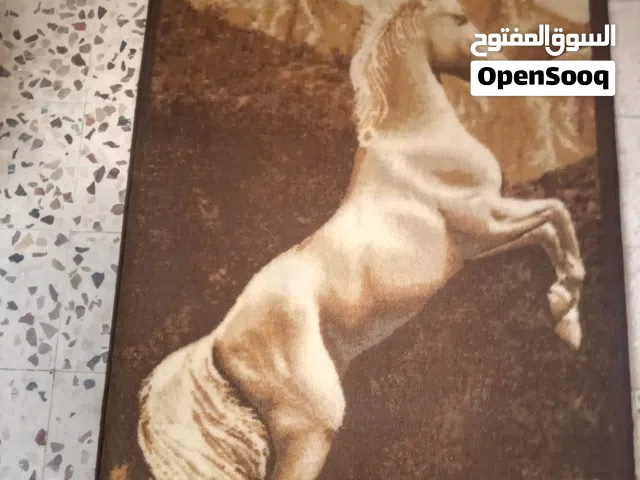 سجاد تعليق الحصان