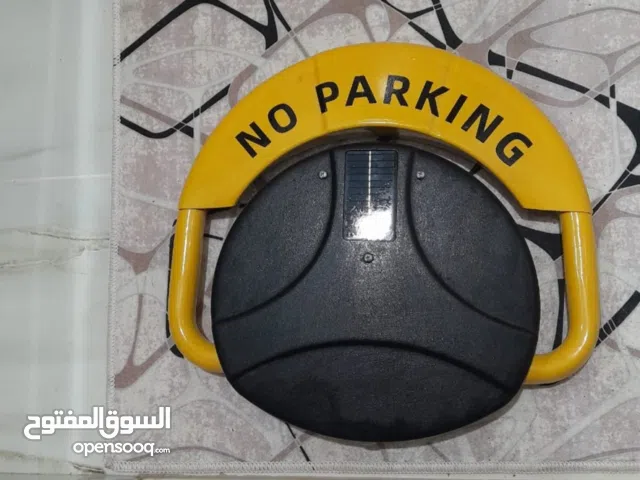 حاجز مواقف السيارة الاوتوماتيكي من البشيتي جديدGarage car locker with remote control