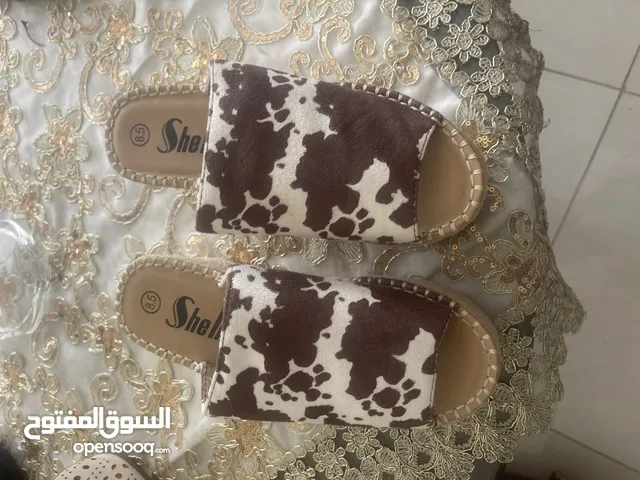 Black With Heels in Amman