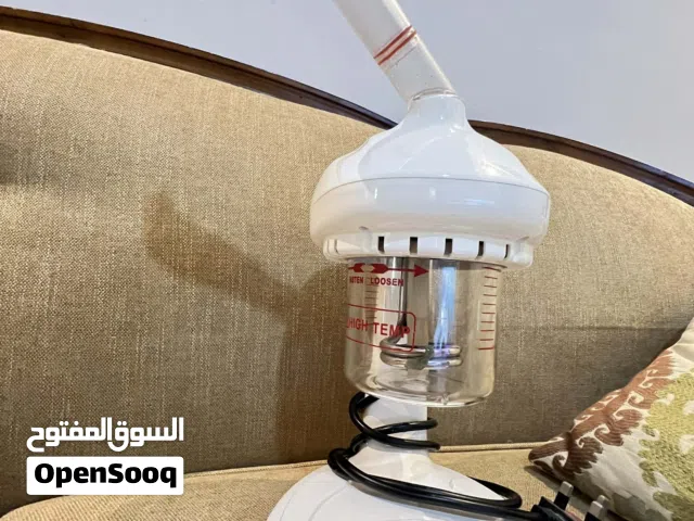 مكواة + محول كهرباء + عناية نسائية ومكواة بحالة ممتازة