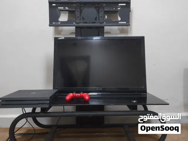 للبيع شاشة شارب 32 بوصة مع الطاولة والقاعدة وشغالة 100%