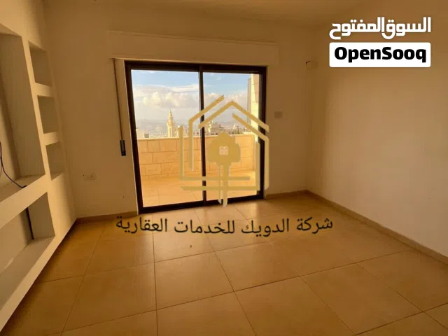 شقة فارغة - الجبيهة - 2نوم - ارضية - ترس - قرب الخدمات العامة