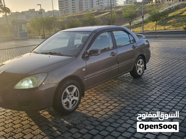2004 ميتسوبيشي لانسر GLX