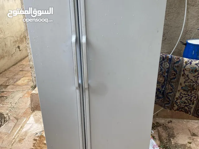 ثلاجه مع فريزر بابين نو فروست ياباني تعمل بشكل ممتاز وبحاله ممتازه بحاله الوكاله للبيع بداعي السفر