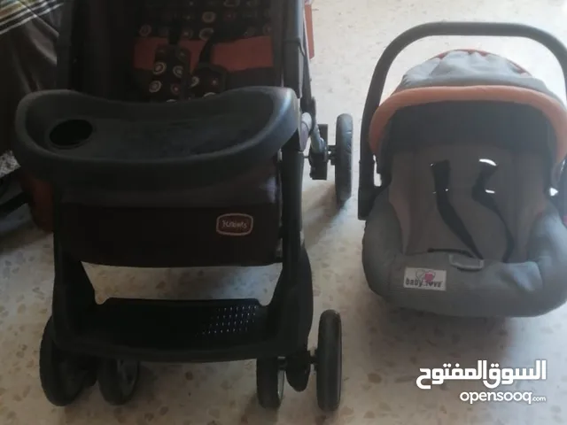 عربية اطفال مع كوت